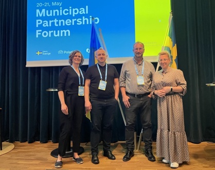 Kristina Prahl, Andriyn Dranchuk, Liubov Petrova och Johan Andersson på konferensen om partnerskap mellan svenska och ukrainska kommuner.
